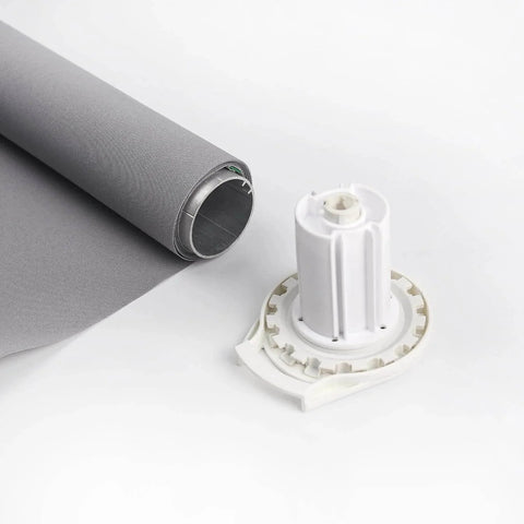 R16 Roller Shade Clutch for 1.5" Tube Roller Shade Brackets & Hardware shown with grey rolled fabric and white clutch