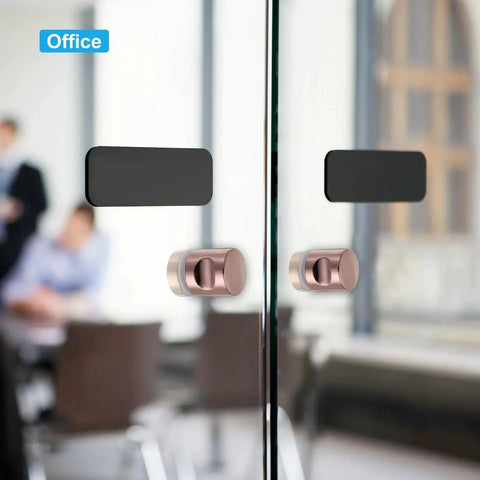 Rose Gold Round Sliding Shower Door Handle Single Side Pull With Screw Hardware Replacement Parts For 6 To 18 Mm Glass Doors 30 Mm Outer Diameter 46 Mm Total Height Column Style Durable Zinc Alloy Construction For Long Lasting Use In Wet Bathrooms installed on glass door in office setting
