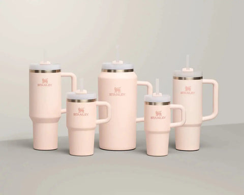 Multiple sizes of rugged 30 oz insulated stainless steel tumblers in Rose Quartz 2.0 with handles and FlowState three-position lids