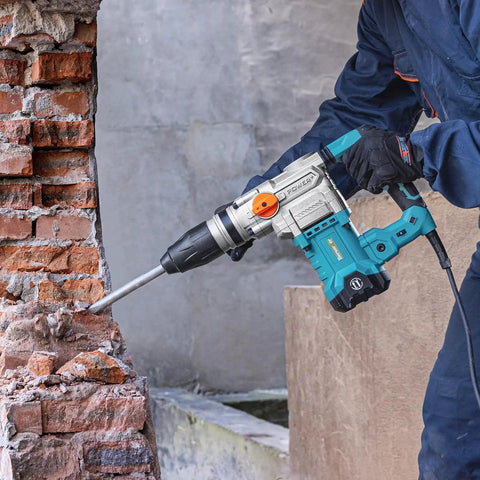 Worker using Heavy Duty SDS Max Rotary Hammer Drill With Vibration Control And Safety Clutch 13 Amp Motor for concrete breaking