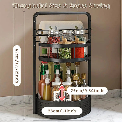 Rotating Spice Rack With Paper Towel Holder 2 Tier Lazy Susan Turntable, black finish, on marble countertop, showing spices and sauces.