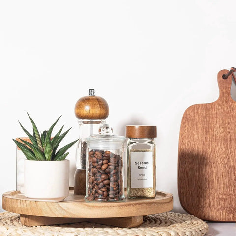 Round Wood Decorative Tray For Bathroom Counter Organizer And Farmhouse Kitchen Decor Wooden Riser displaying jars and plant