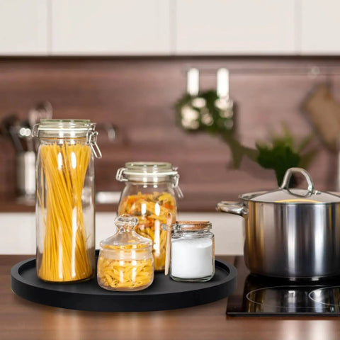 Round Wooden Bathroom Tray With 360 Degree Silent Rotation Lazy Susan Turntable on kitchen counter with jars and pot