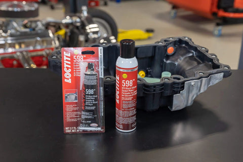 Automotive RTV Silicone Gasket Maker Black 598 For Engine Seals Sensor Safe Non Corrosive Flexible Pro Grade Oil Resistant High Performance Sealant 80 Milliliters 1 Pack displayed with engine component