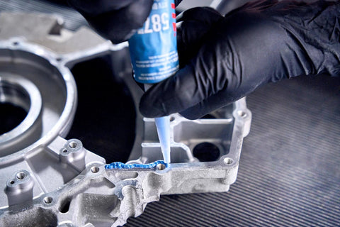 Applying Auto Grade RTV Silicone Gasket Maker Blue 587 Pro Grade High Temp Oil Resistant Sensor Safe Non Corrosive Flexible Sealant