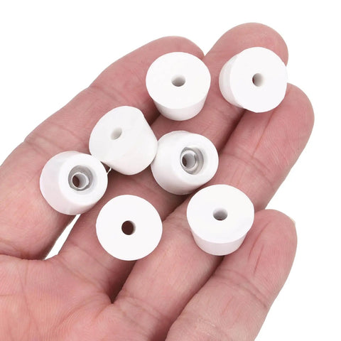 12 Pack Rubber Bumper Feet 0.35 In High By 0.55 In Wide Round Pads With Stainless Steel Washer And Phillips Screws held in a hand
