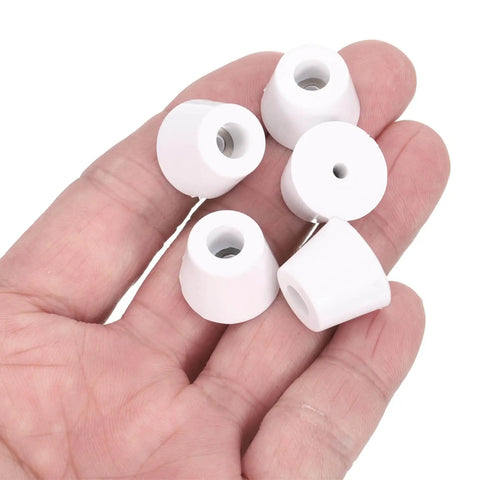 Hand holding five white rubber bumper feet for furniture, part of Eight Pack Rubber Bumper Feet With Stainless Steel Washers And M3x16 Screws, Round Pads Furniture Feet 0.55 Inch High By 0.67 Inch Wide, Non Marking, Corrosion Resistant, Ideal For Furniture Appliances Electronics.