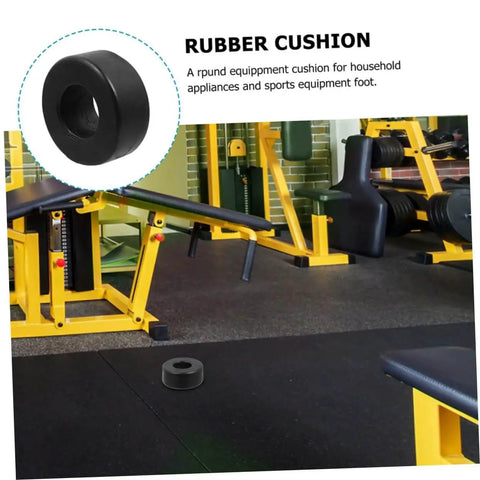 Four Pack Round Rubber Bumpers for Gym Equipment and Home Fitness Machines shown under a weight bench in a gym setting.