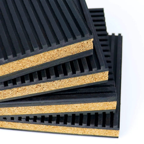 Anti Vibration Pads For Home And Workshop Applications 4 By 4 By 7 Eighth Inch Rubber And Cork Vibration Isolation Pads To Reduce Noise And Vibration Durable Oil Resistant Weatherproof 4 Pack, stack of layered pads, close-up view