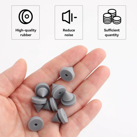 Hand holding 100 Pack Rubber Door Silencers For Metal Doors Half Inch Diameter Anti Collision Silencer Hinge Outlet Stop Noise Reducer