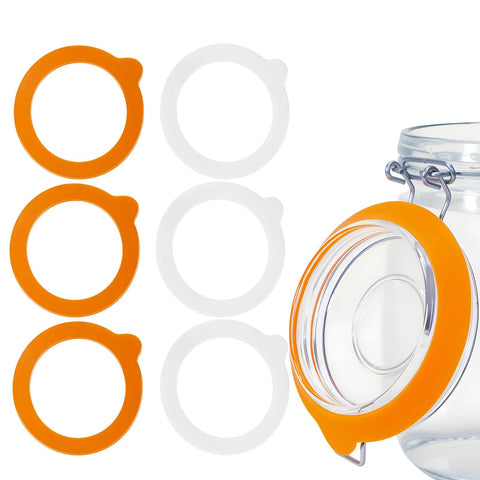 Kitchen jar gasket set: six 3.75-inch silicone seals in white and orange for airtight canning jars.