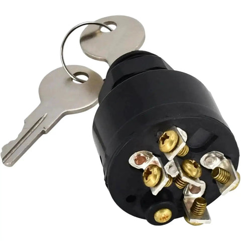 Locking ignition switch with black plastic housing, brass terminal screws, and two keys on a ring (front view).