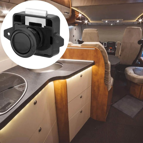 Image of 5 Piece Push Button Latch Cabinet Door Catch Keyless Cupboard Locks For RV Motorhome Camper Caravan Black Durable Zinc Alloy And ABS Construction Easy To Install Keeps Doors Secure While On The Move, shown installed in an RV kitchen.