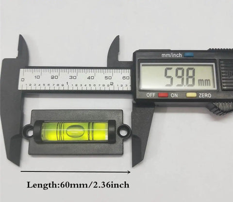 Bubble spirit level from 4 Pack RV Levelers With Screws Bubble Spirit Level For Travel Trailer Motorhome Camping, 60mm long.