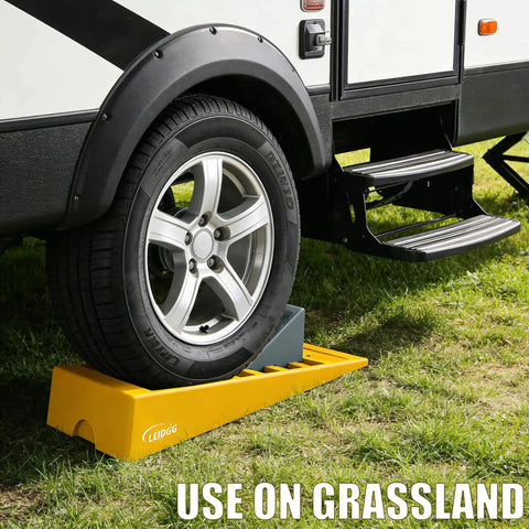 Heavy Duty RV Leveling Blocks Set For Travel Trailers And Campers With Storage Bag Adjustable Up To 3 Inches And Supports Up To 10000 Lbs 2 Pack Leidgg used under RV tire on grassland
