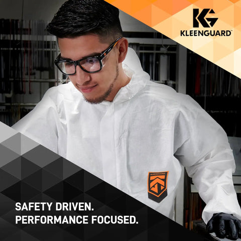 Man wearing Maverick V30 Safety Glasses With Clear Lenses Anti Fog Coating Black Frame in industrial setting.
