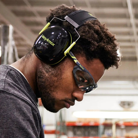 Worker wearing Safety Glasses With Removable Foam Gasket TruShield Anti Fog Adjustable Fit in industrial setting