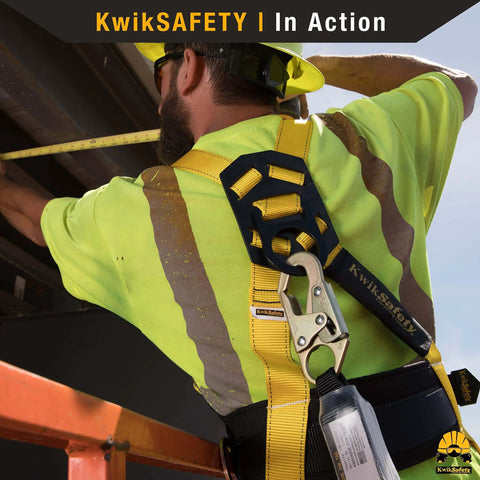 Worker wearing Taipan 6 Foot Double Leg Flat Safety Lanyard with External Shock Absorber during construction.