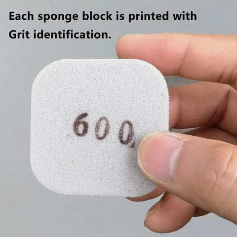 Close-up of a 600 grit sanding sponge from the 27 Pcs Sanding Sponges 2x2 Pads With 9 Grits 320 To 3500 For Craft Polishing set.