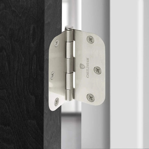Installed 12 Pack Heavy-Duty 3-1/2" Interior Door Hinges with 5/8" Radius Corners - Satin Nickel on black door frame