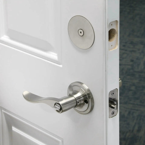 Steel Door Hole Cover Plate Satin Nickel Heavy Duty Fits Doors Up To One And Three Quarter Inches Thick Covers Unused Bore Holes For Privacy And Security Single Pack Ideal For Exterior And Interior Doors installed on white door