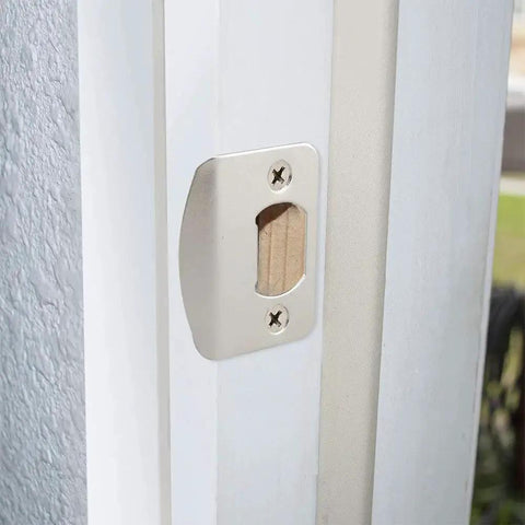 Installed view of universal door strike plate with adjustable latch, 2-pack in satin nickel, screws included, designed to replace worn strike hardware.