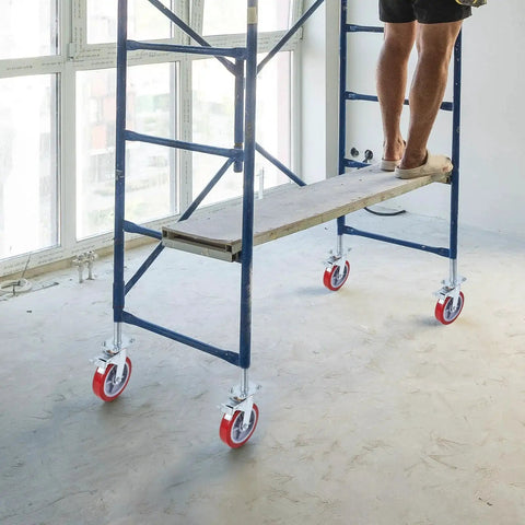 Four Pack 8 Inch Adjustable Leveling Scaffolding Wheels Scaffolding Caster Wheels With Brakes Swivel Locking Casters in use on construction site