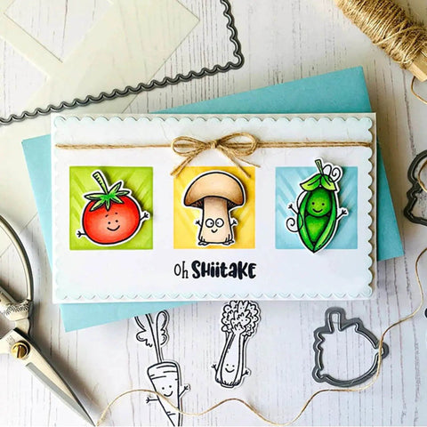 Greeting card with cartoon tomato, mushroom, and pea on scalloped frame with twine, scissors, and cutting dies for DIY crafts