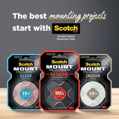 Scotch Mount tapes including Extreme Double Sided Mounting Strips Mega Pack 1 Inch By 3 Inch Tape Holds Up To 30 Lbs Indoor Or Outdoor Use 48 Strips Heavy Duty Industrial Strength Adhesive For Painted Drywall And Other Surfaces displayed on a wooden surface.