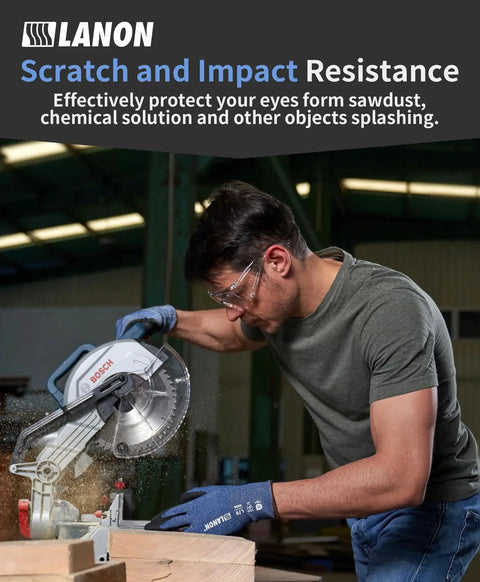 Man using a saw while wearing over-eyeglasses goggles for scratch and impact resistance.