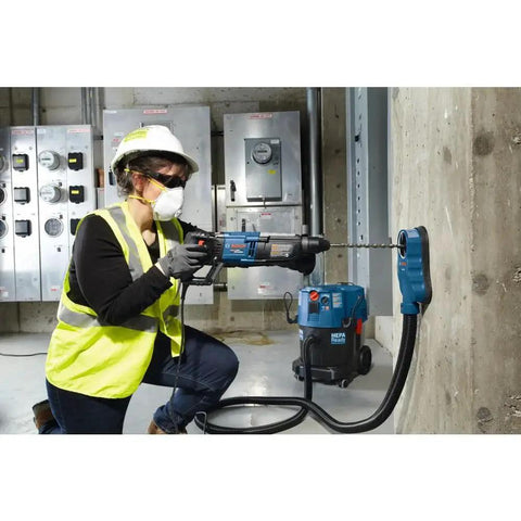 Person using One And One Eighth Inch SDS-Plus Bulldog Xtreme Max Rotary Hammer For Concrete Drilling And Chiseling In Masonry