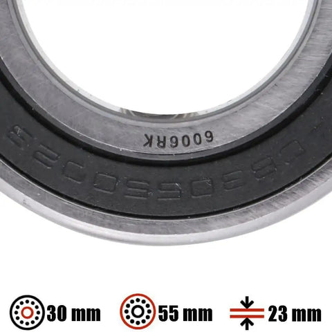 Close-up of sealed double row angular contact ball bearing showing 30mm bore, 55mm outer, 23mm width, and rubber seal detail.