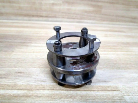 Industrial 1 Inch to 2 Inch Shaft Coupling for Power Transmission Rexnord 114404 PN 114404 on wooden surface