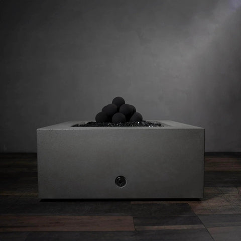 12-Pack Black Ceramic Fire Balls in modern fire pit for outdoor decorative use