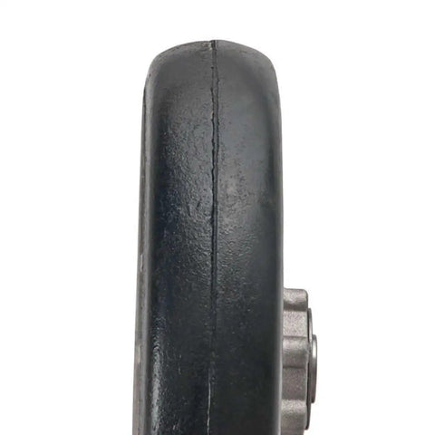 Side view of an Eight Inch Mold On Rubber Wheel For Carts With Red Sealed Semi Precision Ball Bearings By Magliner