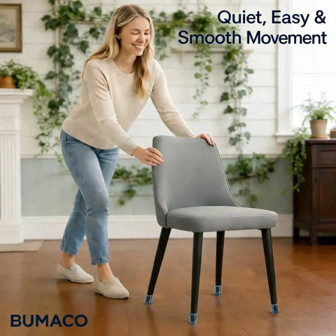 Woman sliding chair with 40 Pack Chair Leg Floor Protectors Silicone Pads For Hardwood Floors Universal Fit For Round Chair Legs From About 1.3 To 2 Inches In Diameter And Square Or Irregular Shaped Legs Durable Non Slip Silicone Sliders To Prevent Scratches And Noise