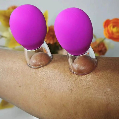 Silicone Cupping Device For Full Body Massage And Lymphatic Drainage Studio Grade Back Massager suction cups in use on arm