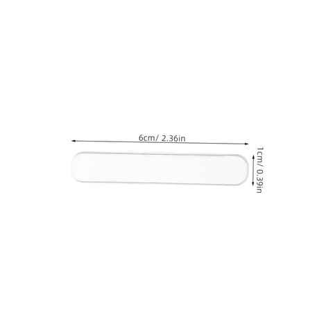 Close-up of transparent silicone door bumper, 6cm x 1cm, part of the 12 Pcs Door Slam Silencer Silicone Cabinet Door Bumpers Adhesive Closers Wall Protectors For Home Non Tool Quick Install And Silent Soft Cushions To Prevent Slams And Protect Walls.