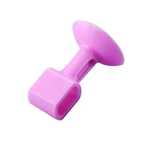 Pink silicone door bumper for wall protection, absorbs impact and reduces noise on doors, cabinets, handles. Durable, flexible cushion