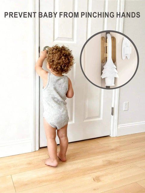 Christmas Tree Hanging Silicone Door Pinch Guard And Anti Door Slam Stopper Set For Baby Proofing Homes Keeps Doors Open And Fingers Safe With Hidden Hinge Mount Kid Safe And Easy To Install 2 Pack White shown on door hinge with toddler nearby