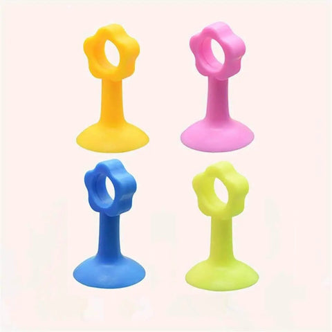 Colorful silicone door stopper bumper pad and wall protector for soft closing doors and cabinets reduces noise and impact.