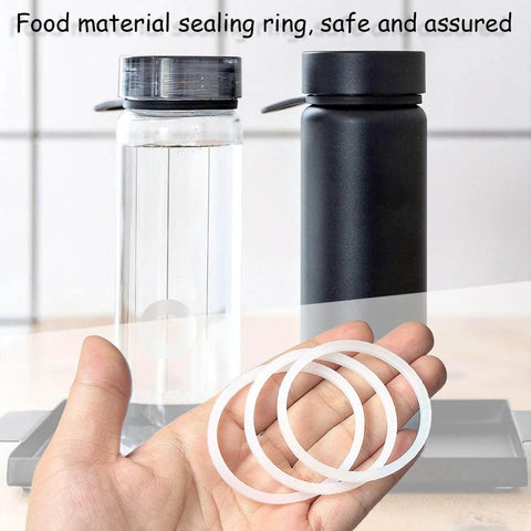 Hand holding 6 Pack Water Bottle Gasket Replacements For Wide Mouth Flip Lids, Silicone O Rings And Seals, 57mm Outer Diameter