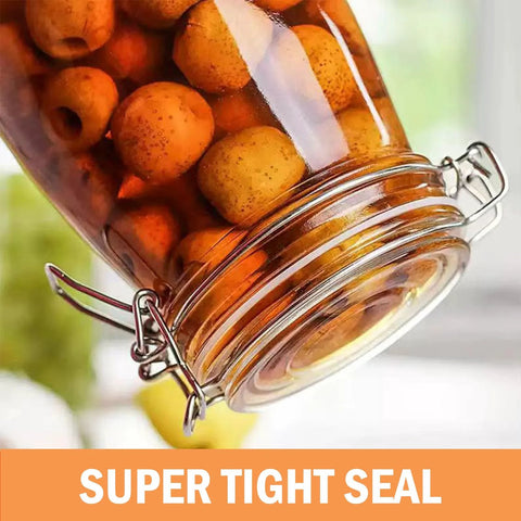 Glass canning jar with metal clamp lid and white gasket, filled with dried apricots.