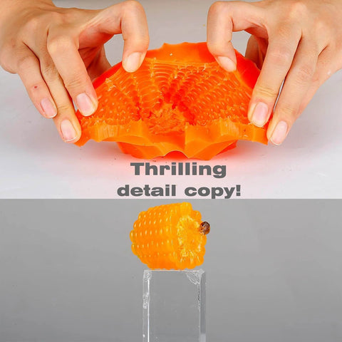 Silicone Mold Making Kit For Resin Soap And Candle Casting With 1A1B By Volume 15A Shore Fast Cure Low Viscosity Silicone 2.2 Lb Kit Leak Proof Bottles Easy One To One Mix Ideal For DIY Mold Creations - orange silicone mold being manipulated by hands showing flexibility and detail, and a corn-shaped silicone cast displayed on a stand.