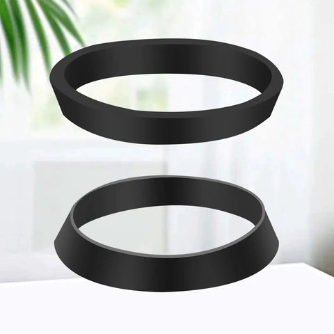 Two black silicone seal ring washers for 1.5 inch drain pipes on a light background.