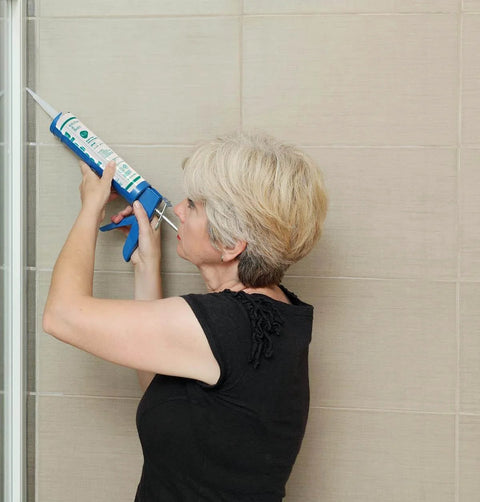 Black 100 Percent Silicone Sealant Caulk For General Purpose Use Waterproof Odor Free No Yellowing Color Stable Ten Point One Ounce Cartridge Quick Cure In About 30 Minutes Ready For Water Exposure applied on bathroom tile