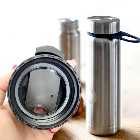 6 Pack Water Bottle Gasket Replacements For Wide Mouth Flip Lids, Silicone O Rings And Seals, shown with stainless steel bottle