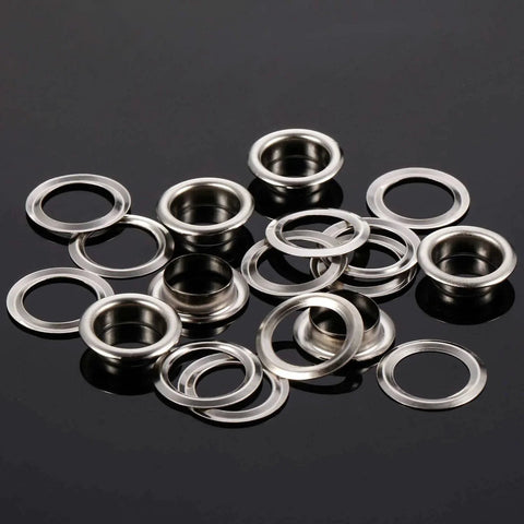 500 Pcs Grommet and Washer Kit for Leather, Fabric and Bags 1/4 Inch Inner Diameter Silver Finish Eyelets on black surface