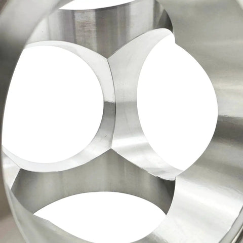Close-up of Pro Grade Six Way Vacuum Chamber Flange Cube Flange in 304 stainless steel showing internal channels and connections.