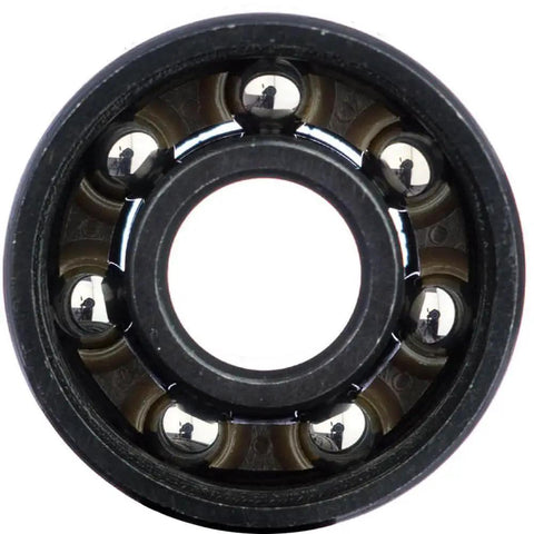 Close-up of a High Performance Skate Bearing with diamond polished raceways, USA-made, for smooth spins with Stackz Graphflo lubricant.